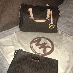 MK duffle bag/ wristlet with MK storage bag.